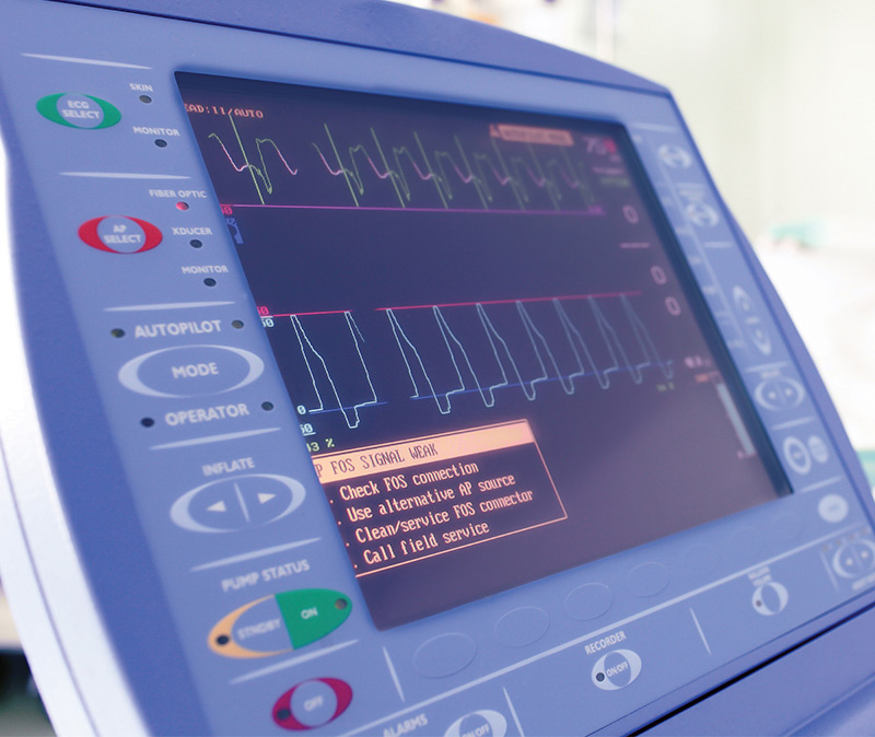 Point of Care & Patient Monitoring - A close-up of a medical monitor displaying vital signs and a warning message indicating an FDS signal error with troubleshooting instructions.